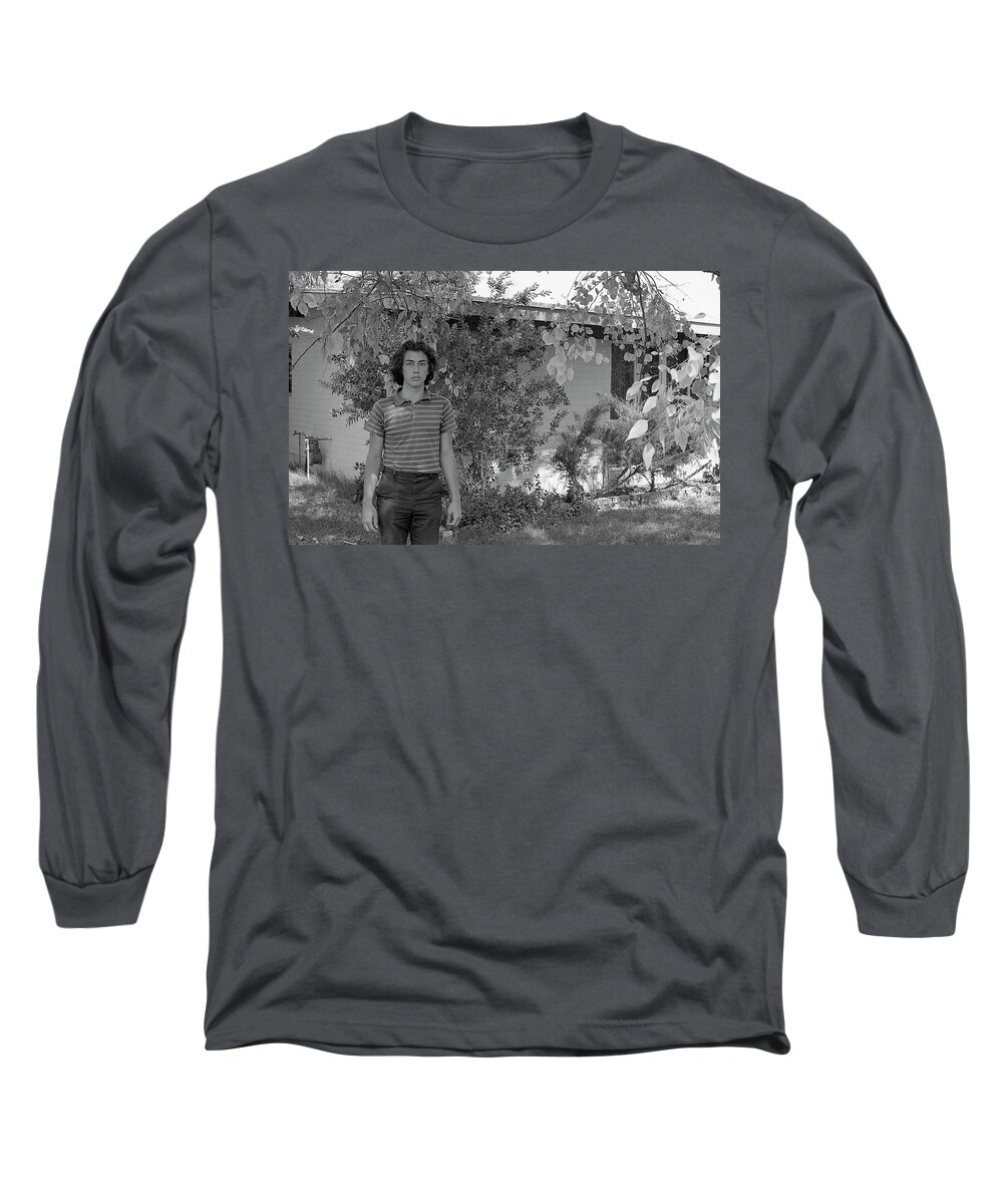 Phoenix Long Sleeve T-Shirt featuring the photograph Man in Front of Cinder-block Home, 1973 by Jeremy Butler
