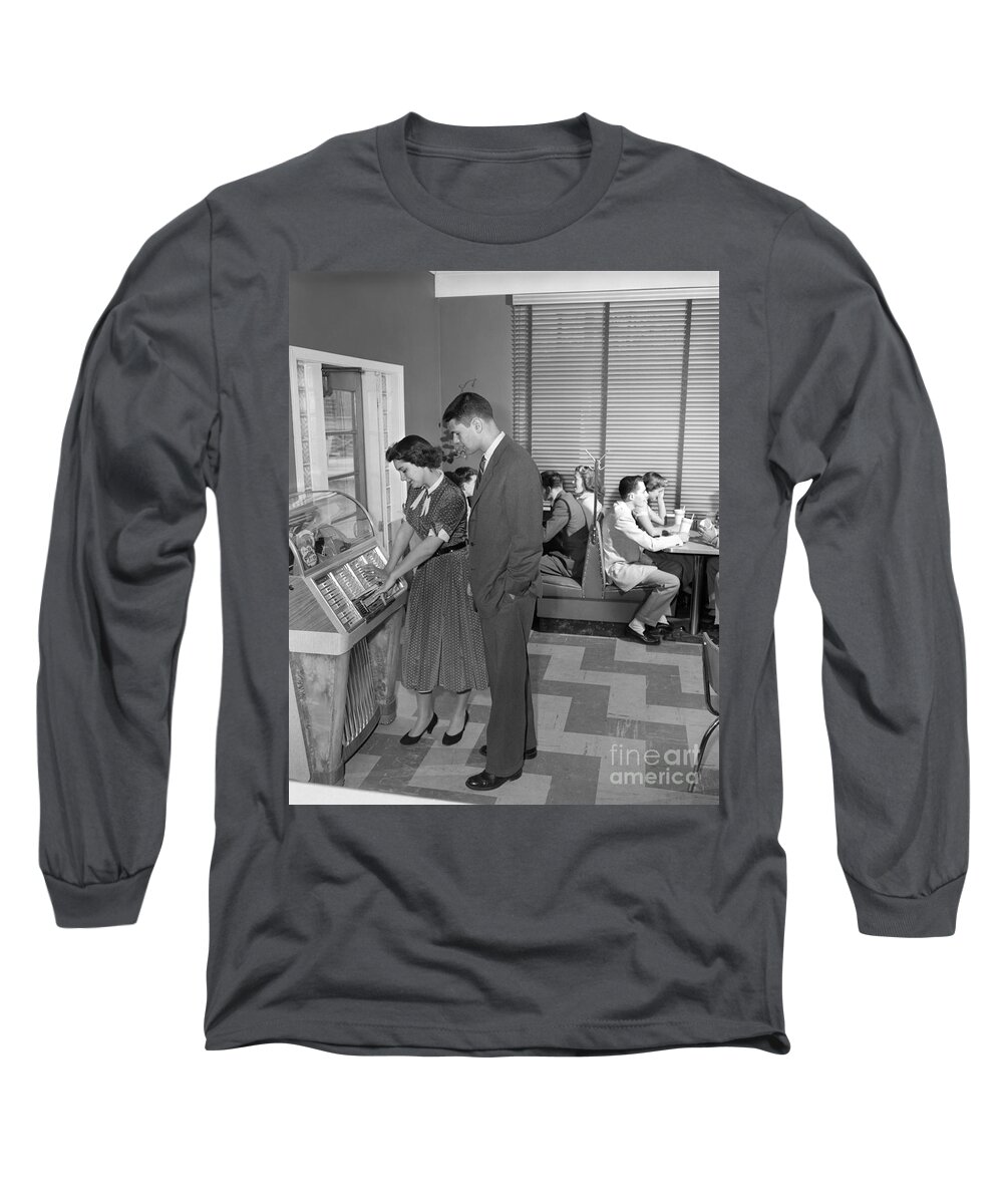 1950s Long Sleeve T-Shirt featuring the photograph Teen Couple Playing Jukebox, C. 1950s by H. Armstrong Roberts/ClassicStock