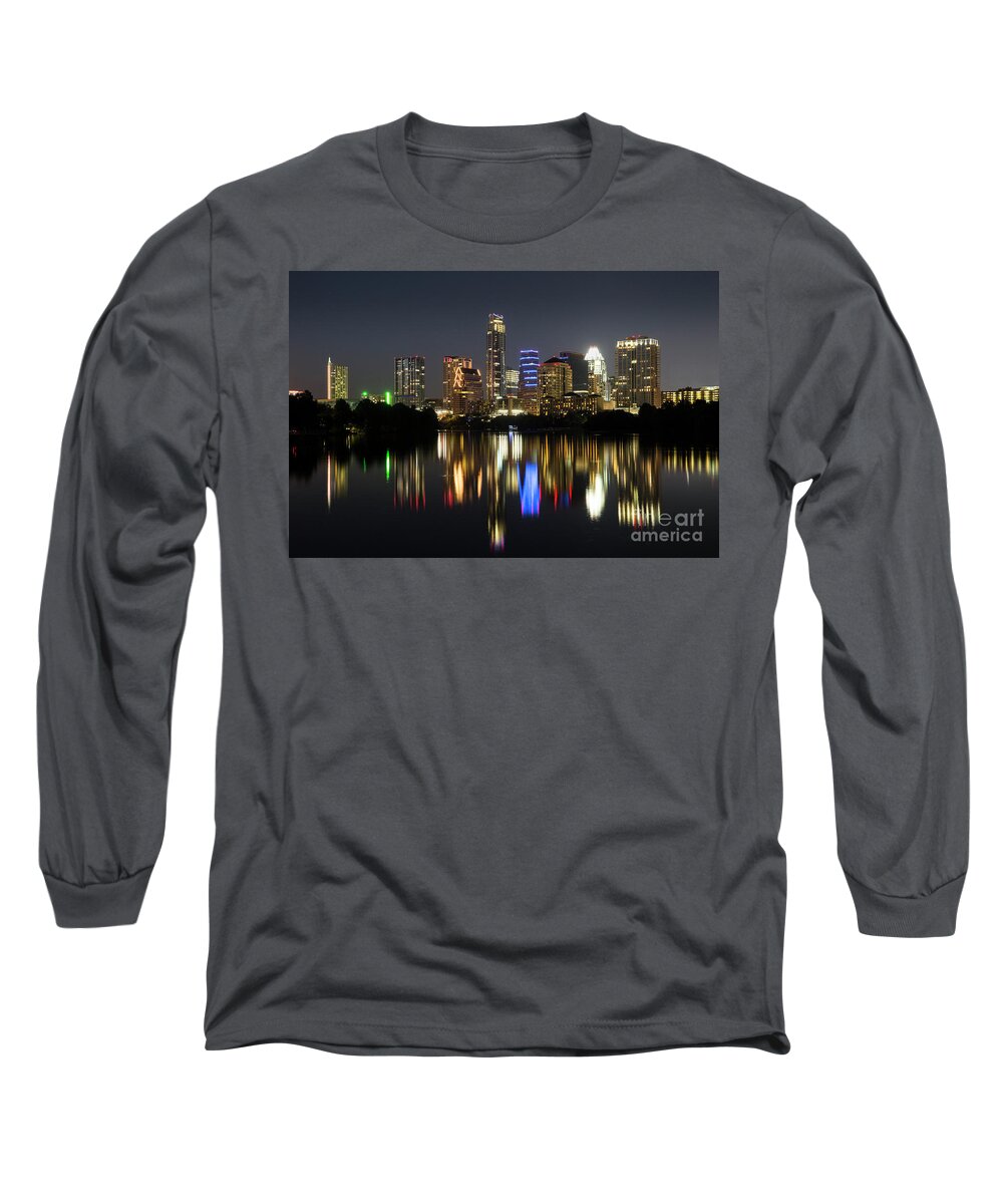 Austin Skyline Pictures Long Sleeve T-Shirt featuring the photograph The glimmering Austin Skyline sparkles at night with a view from the Boardwalk Trail on Lady Bird Lake by Dan Herron
