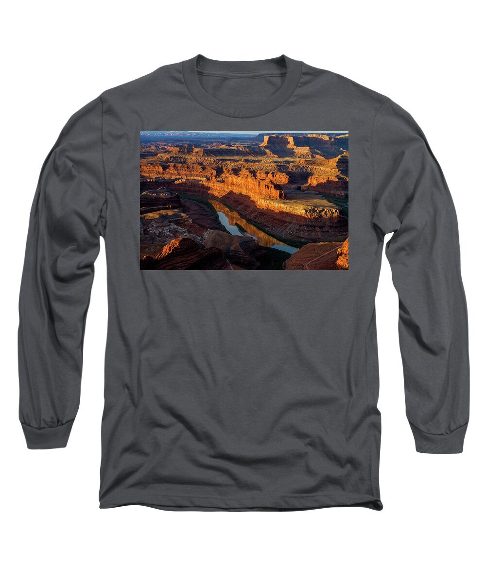 The Almost Full Moon Setting Over The Canyon At Dead Horse Point In Utah As The Sun Rose Lighting Up The Canyon Below. Long Sleeve T-Shirt featuring the photograph Canyon Wall Reflection by Johnny Boyd