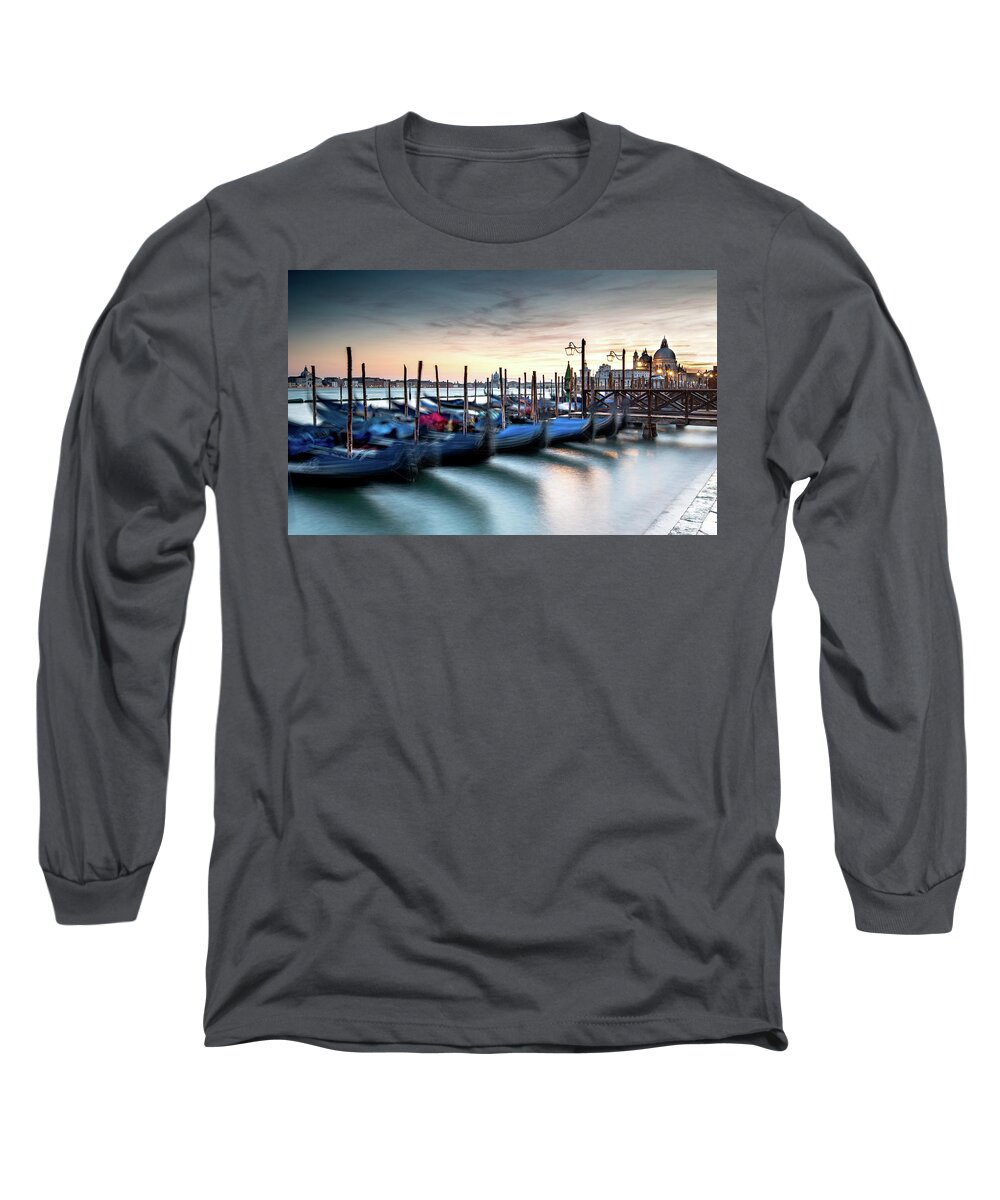 Gondola Long Sleeve T-Shirt featuring the photograph Venice Gondolas moored at the San Marco square. by Michalakis Ppalis