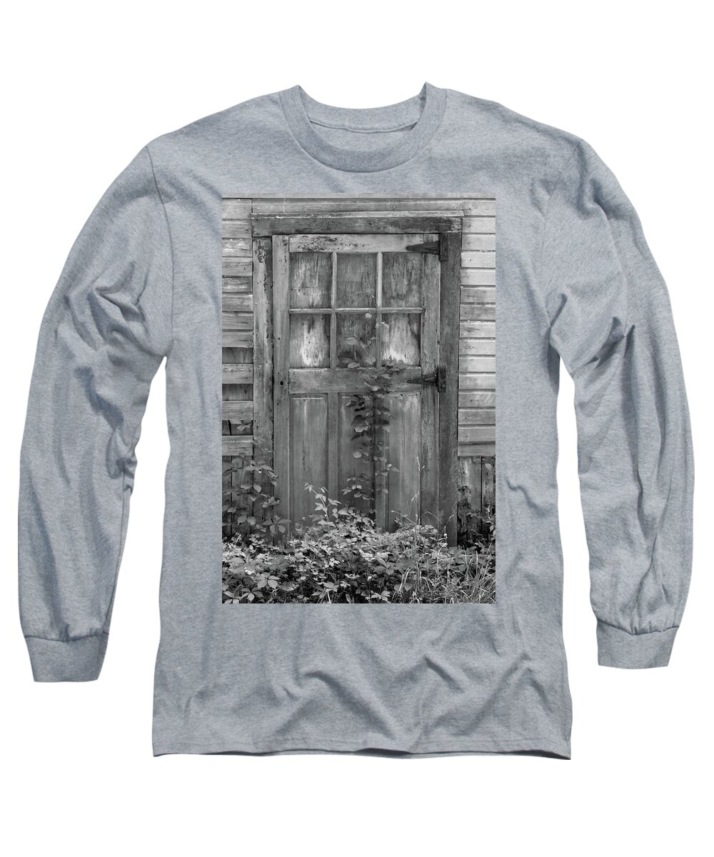 Black And White Barn Long Sleeve T-Shirt featuring the photograph Weathered Wood Barn Door with Vine by David Letts