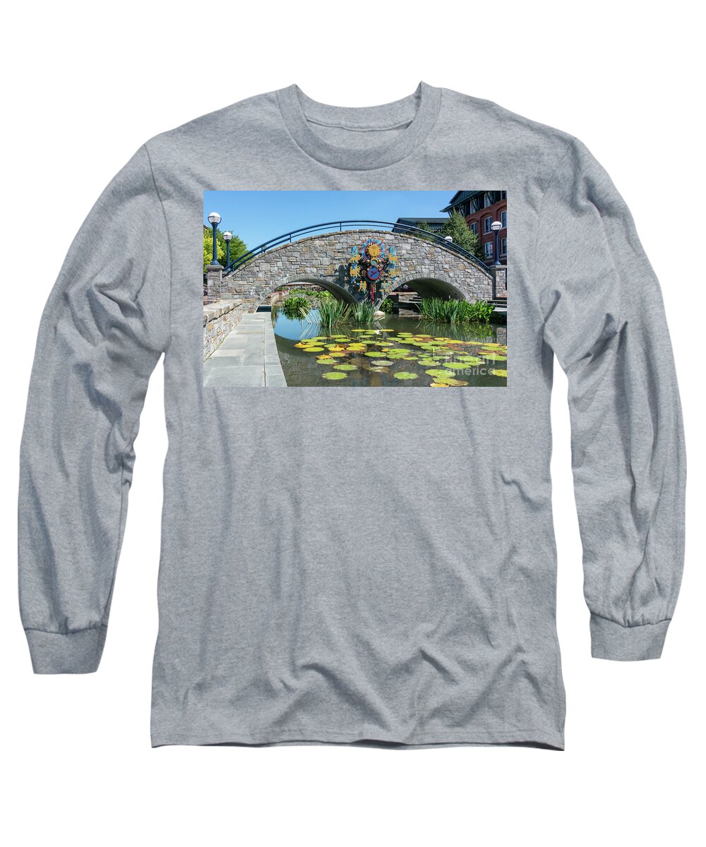 Carroll Creek Long Sleeve T-Shirt featuring the photograph Zodiac inspired clock on a stone bridge in Carroll Creek Park in Frederick Maryland by William Kuta
