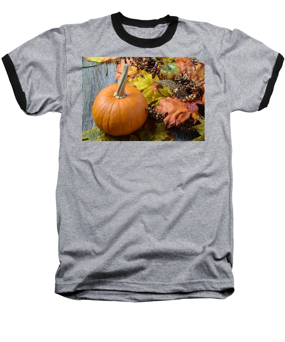 Nobody Baseball T-Shirt featuring the photograph Autumn Pumpkins surrounded by leaves by Brandon Bourdages