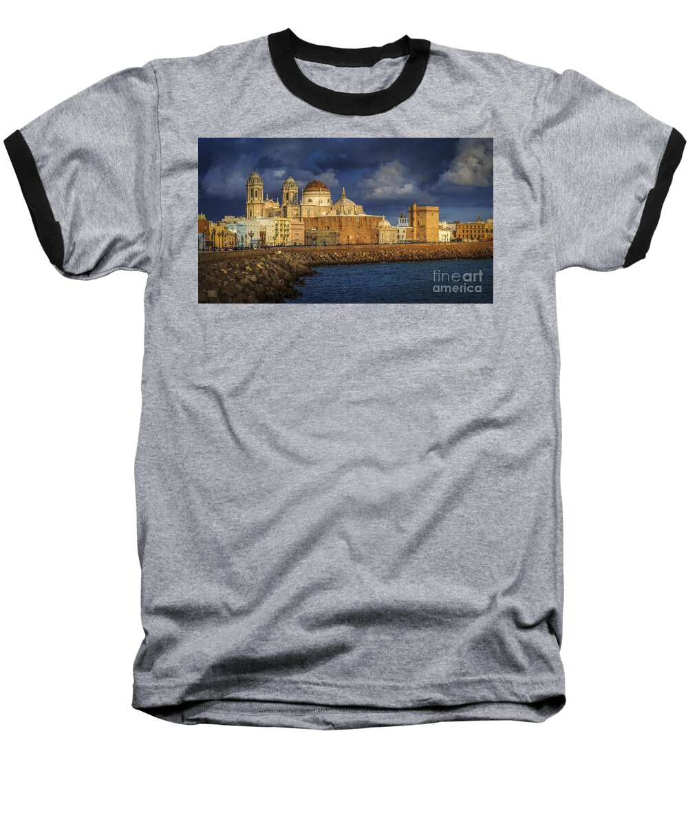 Andalucia Baseball T-Shirt featuring the photograph Stormy Skies Over the Cathedral Cadiz spain by Pablo Avanzini