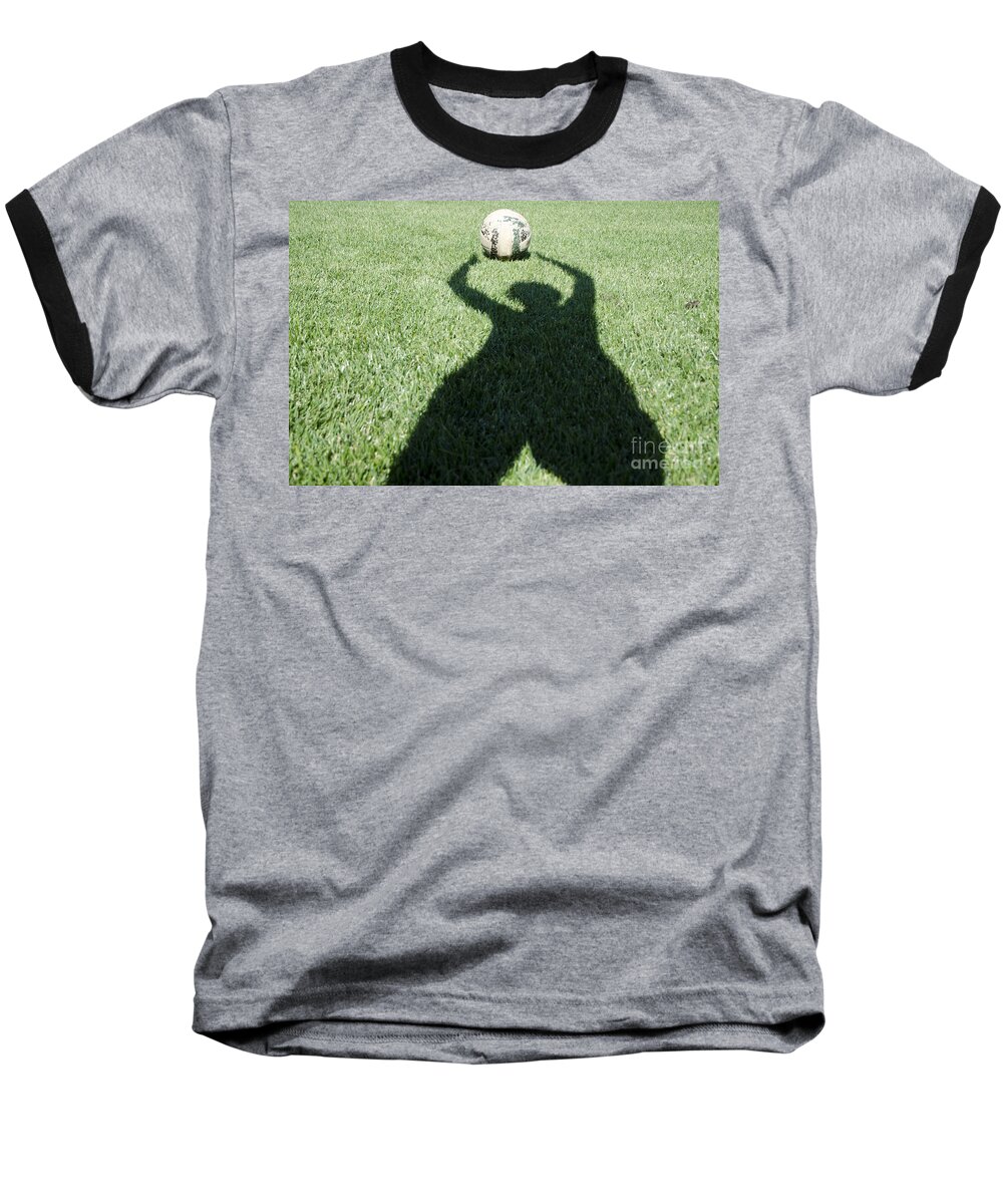 Football Baseball T-Shirt featuring the photograph Shadow playing football by Mats Silvan