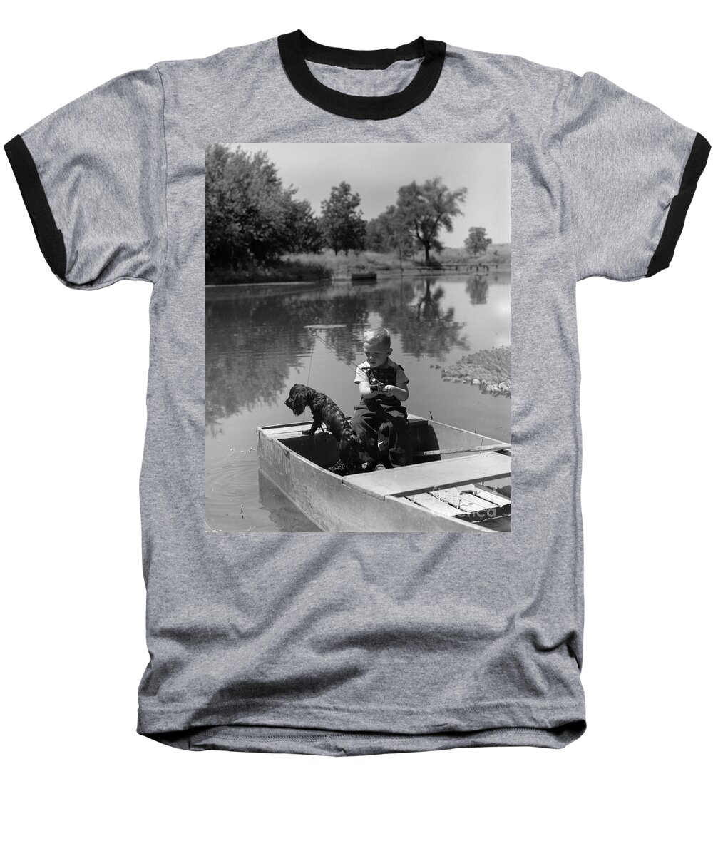 1940s Baseball T-Shirt featuring the photograph Boy With Dog In Fishing Boat by CS Bauer and ClassicStock