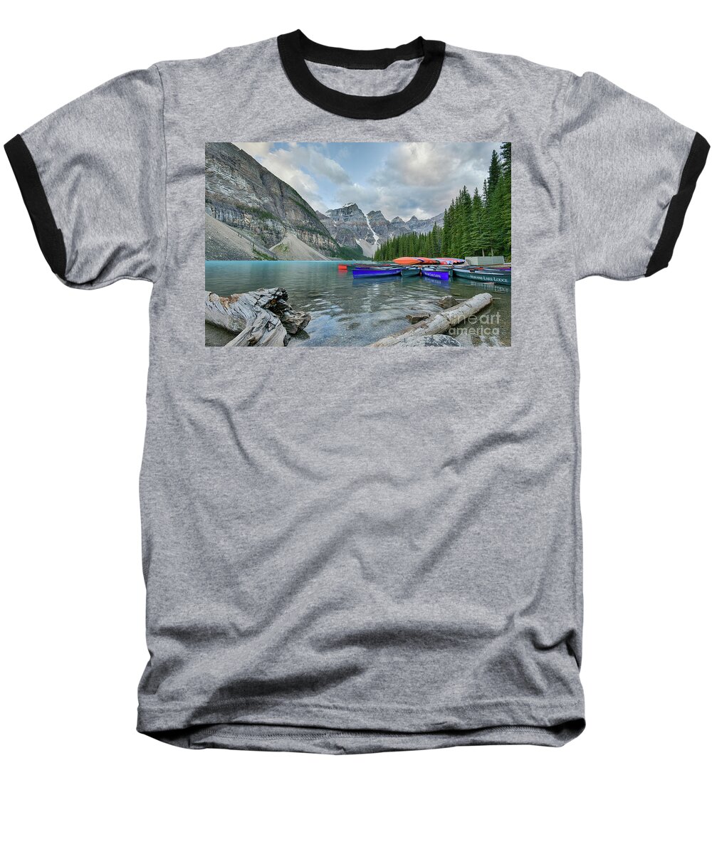 Moraine Lake Baseball T-Shirt featuring the photograph Moraine logs and canoes by Paul Quinn