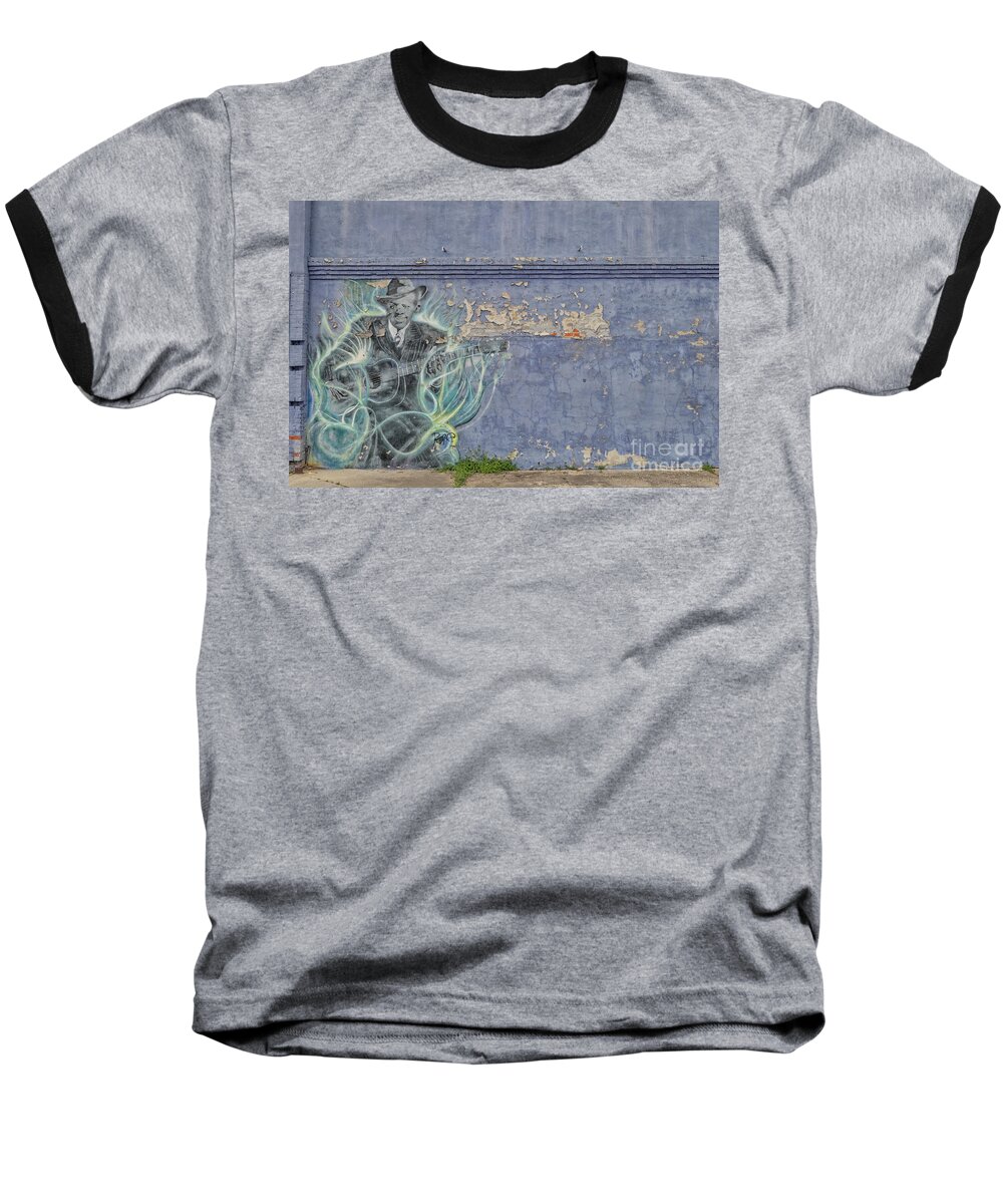 Art Baseball T-Shirt featuring the photograph Mural of Robert Johnson on a wall in Clarksdale by Patricia Hofmeester