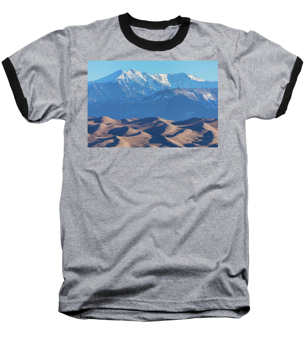 Colorado Baseball T-Shirt featuring the photograph Snow Covered Rocky Mountain Peaks with Sand Dunes by James BO Insogna