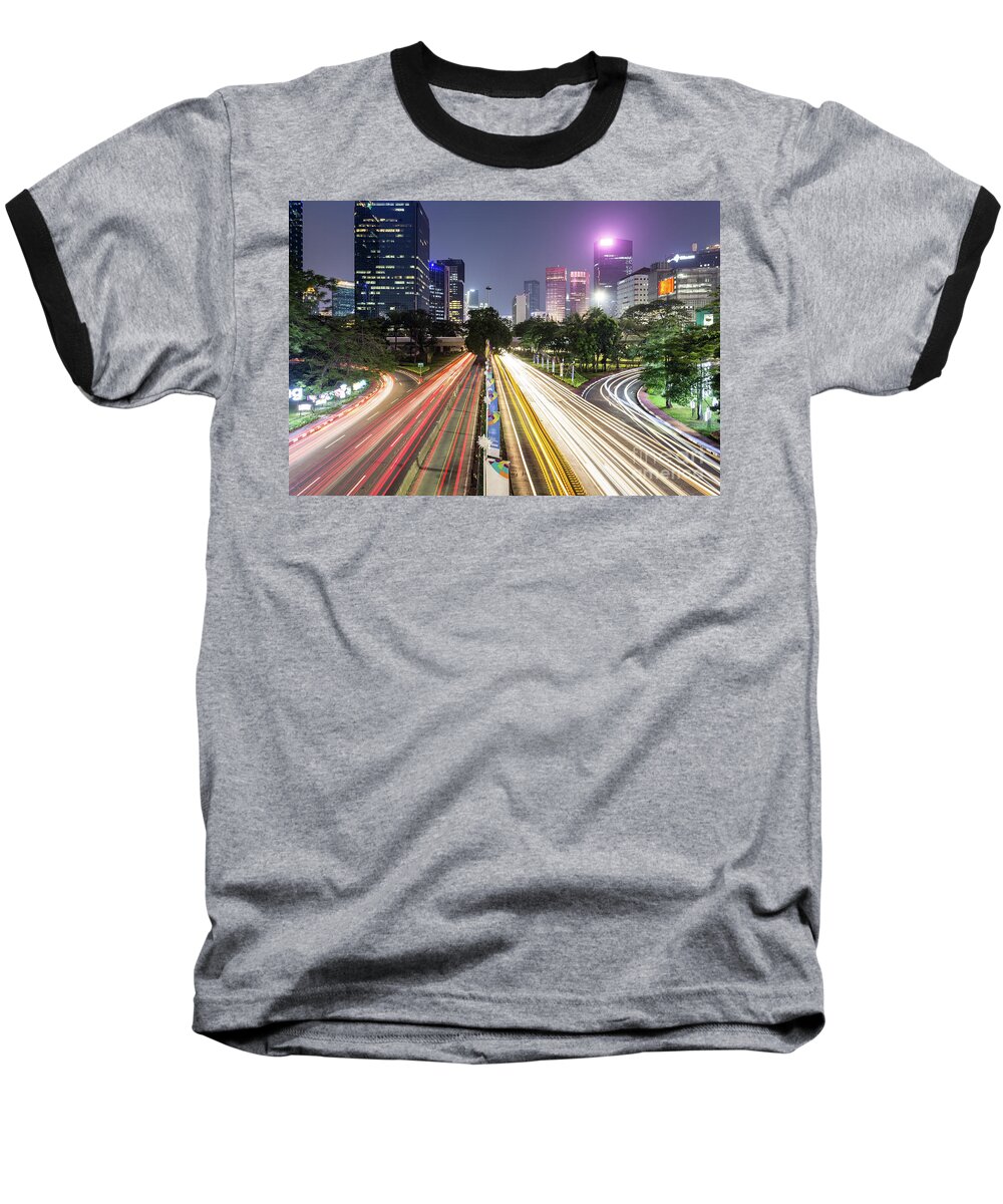 Capital Cities Baseball T-Shirt featuring the photograph Traffic night rush in Jakarta, Indonesia capital city. by Didier Marti