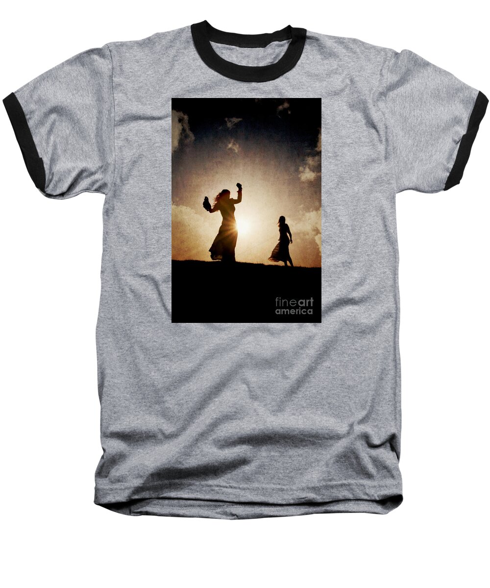 Woman Baseball T-Shirt featuring the photograph Two women dancing at sunset by Clayton Bastiani