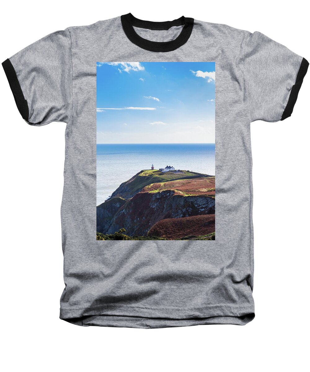 Baily Lighthouse Baseball T-Shirt featuring the photograph View of the trails on Howth Cliffs with the lighthouse in Irelan by Semmick Photo
