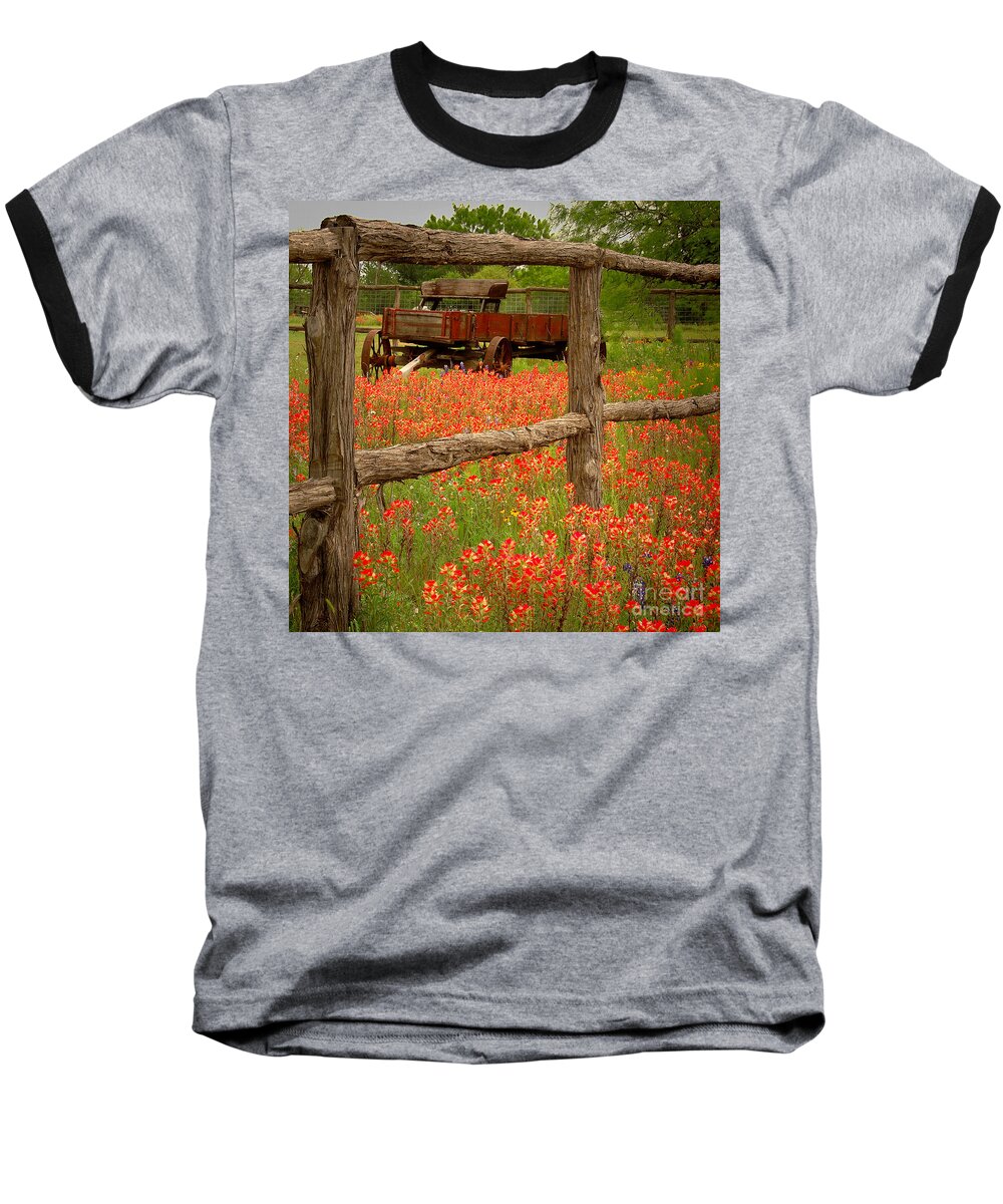 Spring Baseball T-Shirt featuring the photograph Wagon in Paintbrush - Texas Wildflowers wagon fence landscape flowers by Jon Holiday