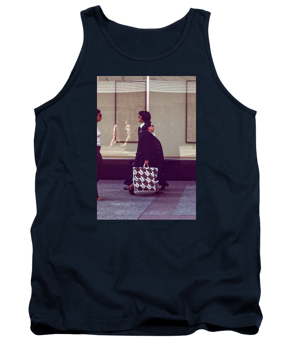 Actions Tank Top featuring the photograph Coming and going by Mike Evangelist