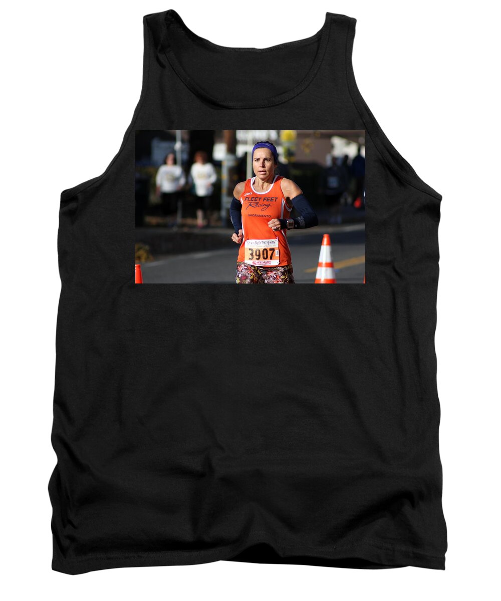 Run To Feed The Hungry 2013 Tank Top featuring the photograph Leilani Finish #1 by Randy Wehner