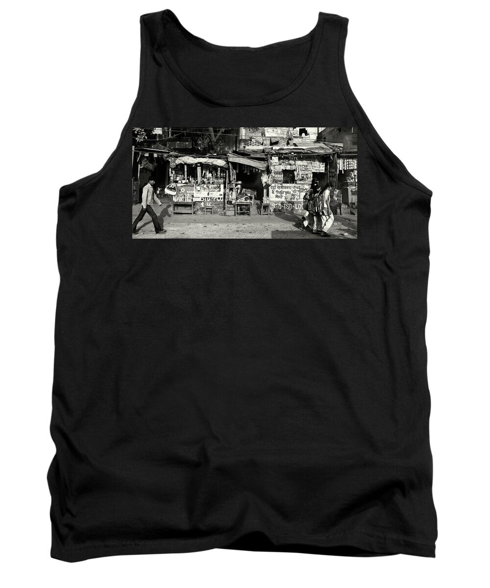 Travel Tank Top featuring the photograph Man woman and schoolgirls by Roberto Pagani