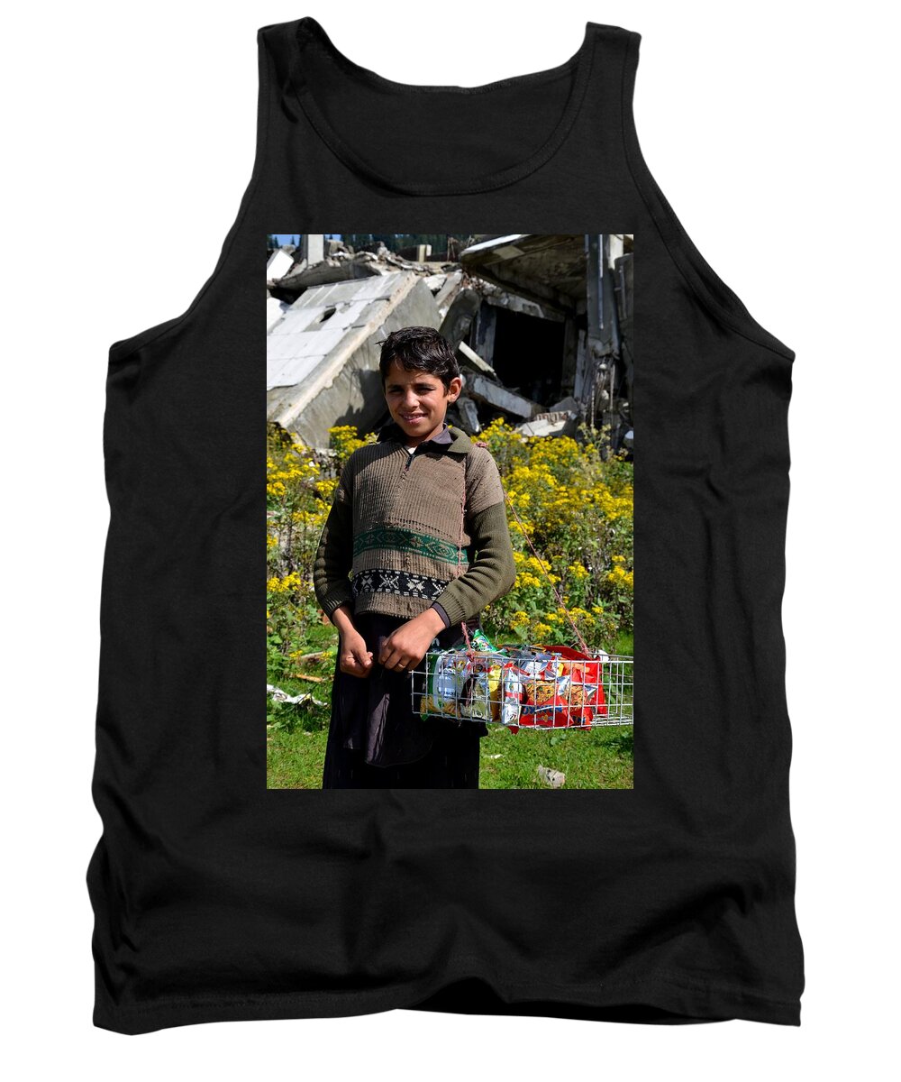 Boy Tank Top featuring the photograph Pakistani boy in front of hotel ruins in Swat Valley by Imran Ahmed