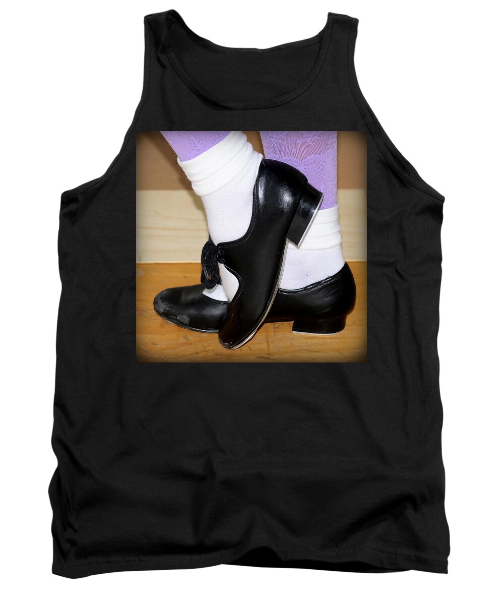 Black Tank Top featuring the photograph Old Tap Dance Shoes With White Socks And Wooden Floor by Pedro Cardona Llambias