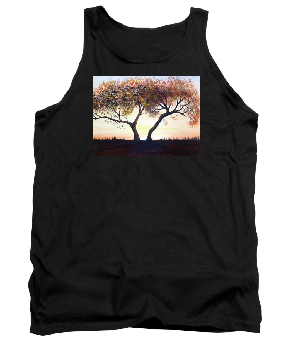 A One Hundred Year Old Tree In The Middle Of A Meadow. The Sun Is Coming Up In A Cloudless Sky With Distance Trees In The Background. The Tree Has Many Dead Branches And The Leaves Are Multiple-colored. Tank Top featuring the painting The Eli Tree by Martin Schmidt