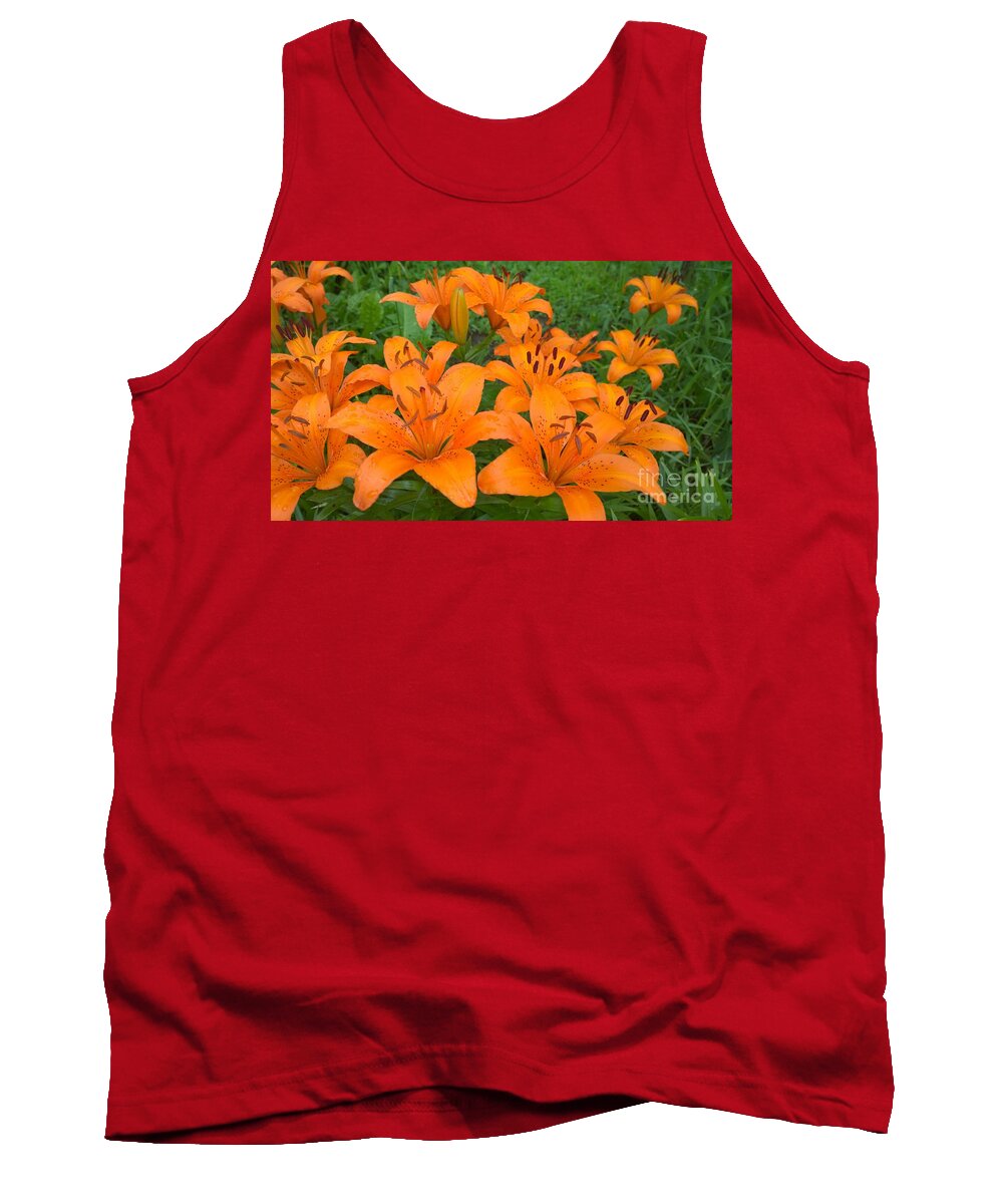 Lilys Tank Top featuring the photograph A garden full of Lilies by Jennifer E Doll