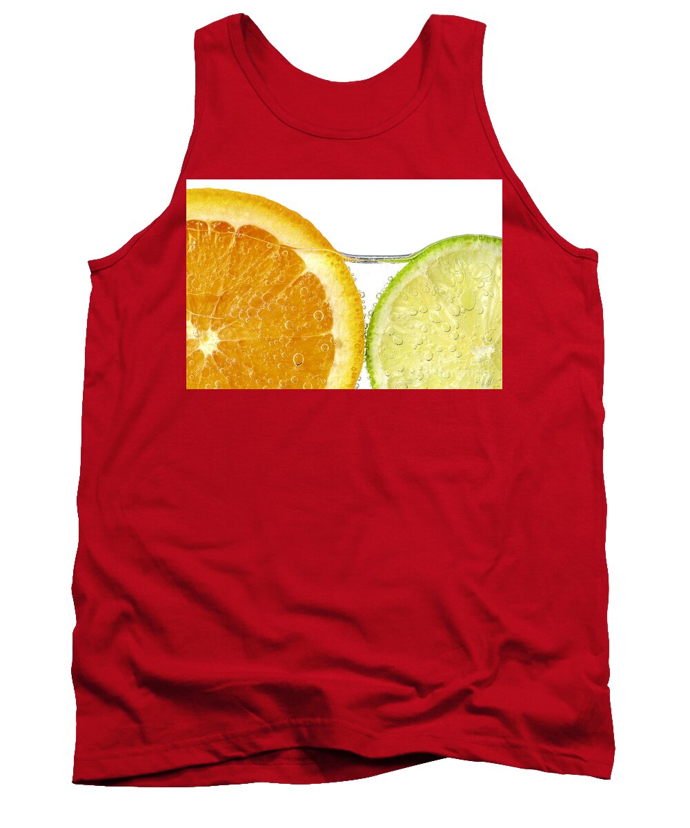 Orange Tank Top featuring the photograph Orange and lime slices in water by Elena Elisseeva