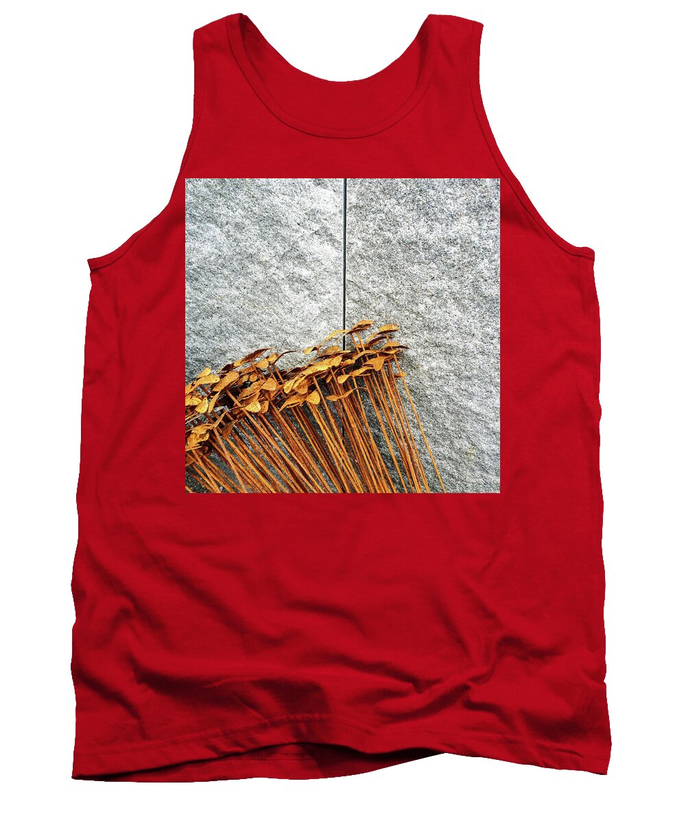 Flower Tank Top featuring the photograph Rusty iron flowers on granite background by GoodMood Art
