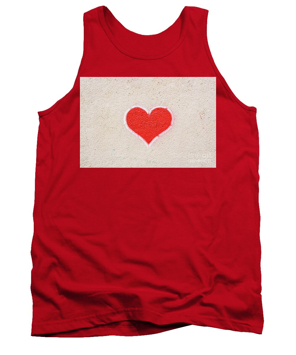 Abstract Tank Top featuring the photograph Red heart painted on a wall, message of love. by Joaquin Corbalan
