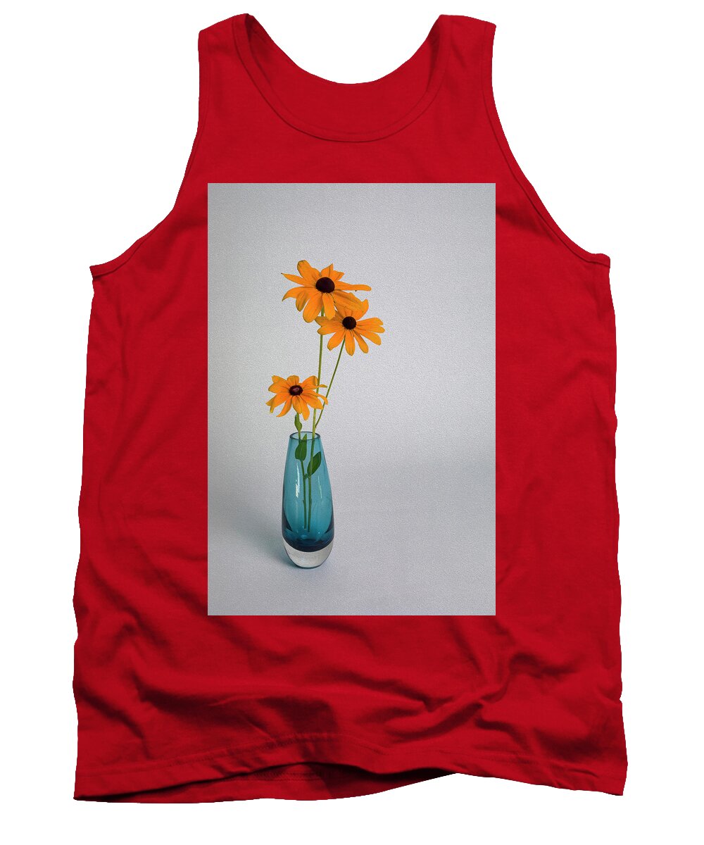 Black-eyed Susan Tank Top featuring the photograph Blue Vase on White Background with Three Black-eyed Susans by Charles Floyd
