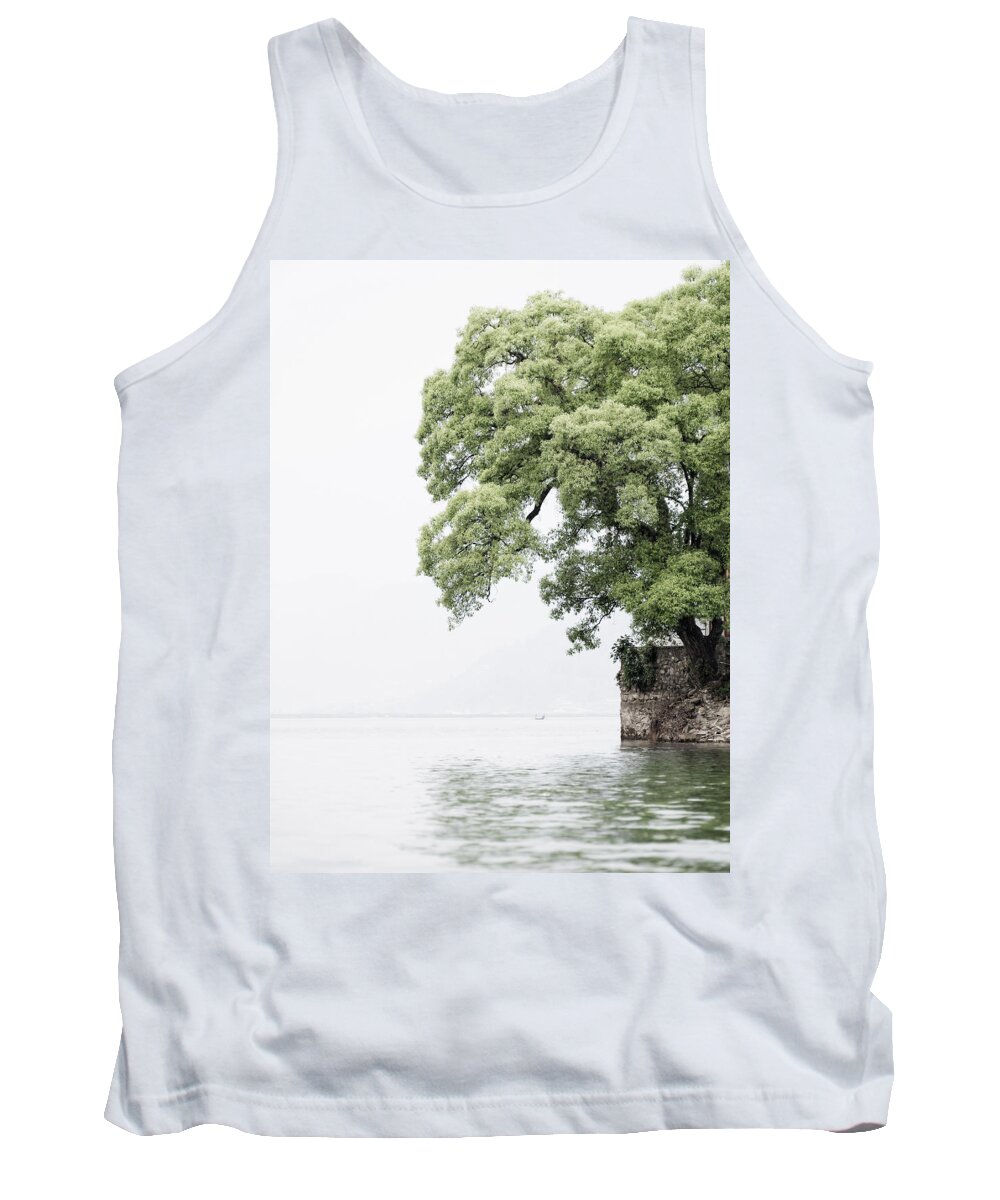 Tree Tank Top featuring the photograph Tree next to a lake by Dutourdumonde Photography