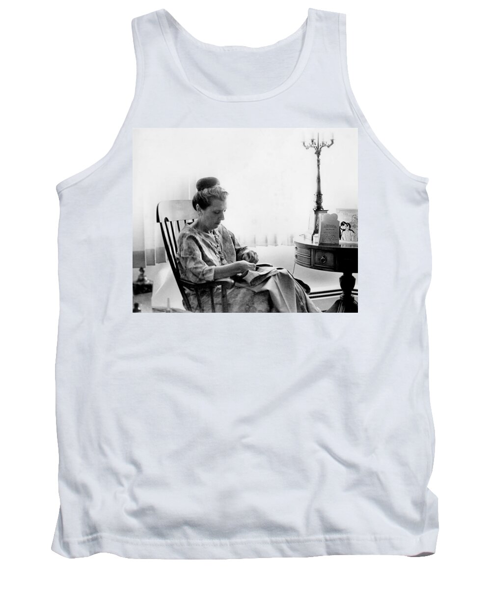 Woman Tank Top featuring the photograph Mending More Than Clothes by Rory Siegel