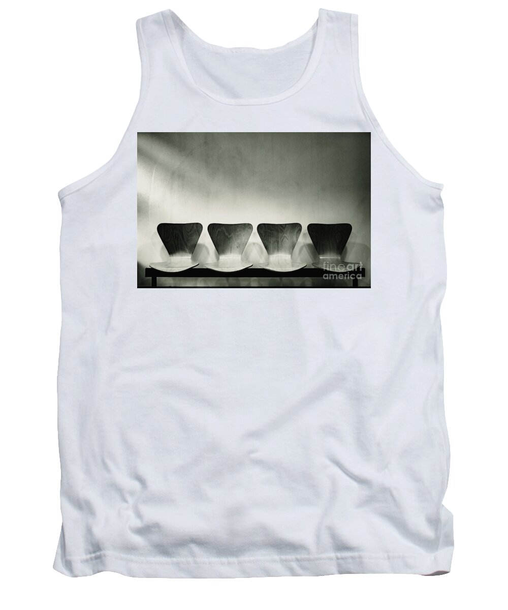 Appointment Tank Top featuring the photograph Waiting room with empty wooden chairs, concept of waiting and passage of time, black and white image, free space for text. by Joaquin Corbalan