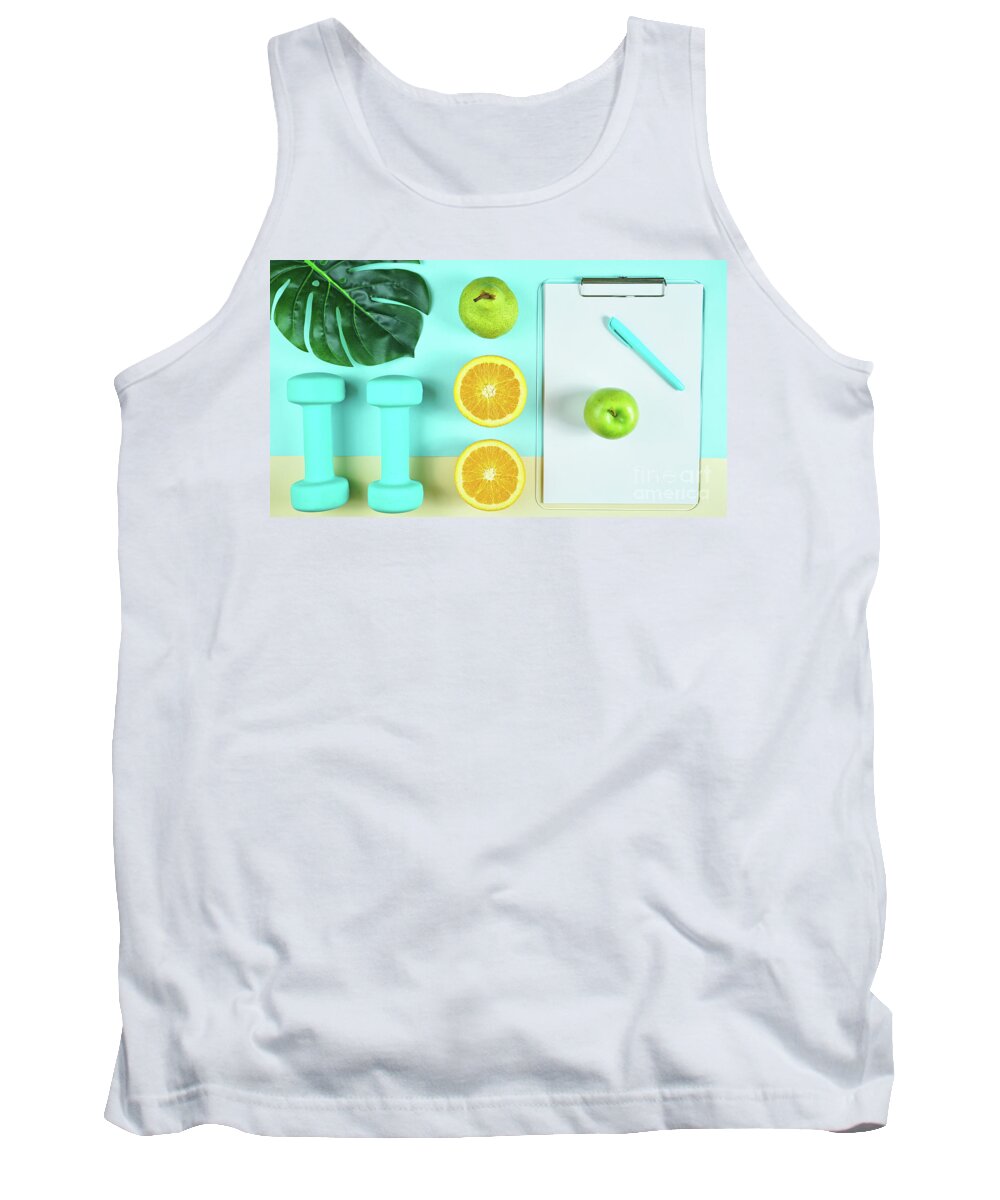 Health Tank Top featuring the photograph Health and fitness concept on modern colorful background. by Milleflore Images