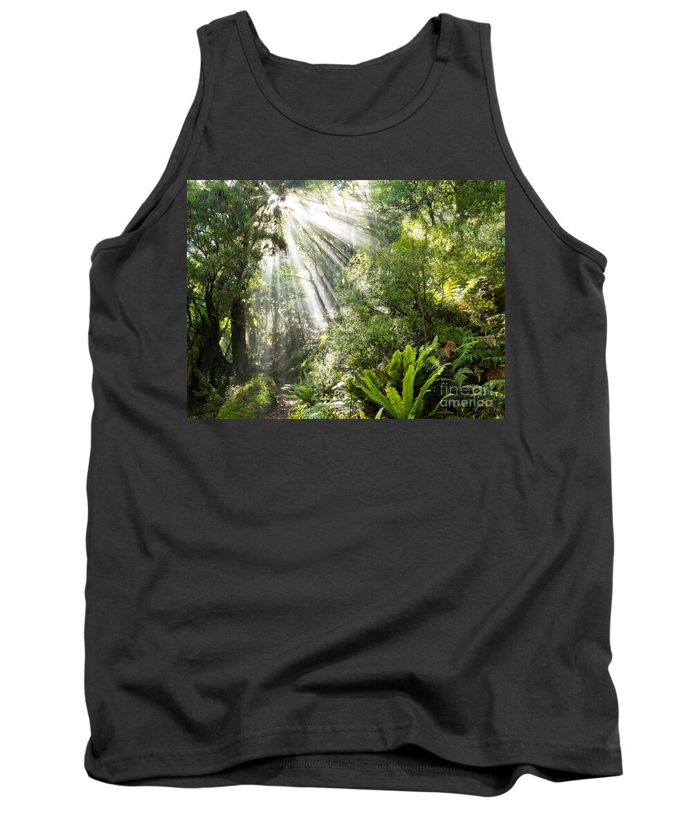 Beam Tank Top featuring the photograph Rays of sunlight beam trough dense tropical jungle by Stephan Pietzko