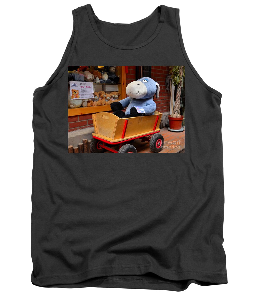 Donkey Tank Top featuring the photograph Stuffed donkey toy in wooden barrow cart by Imran Ahmed