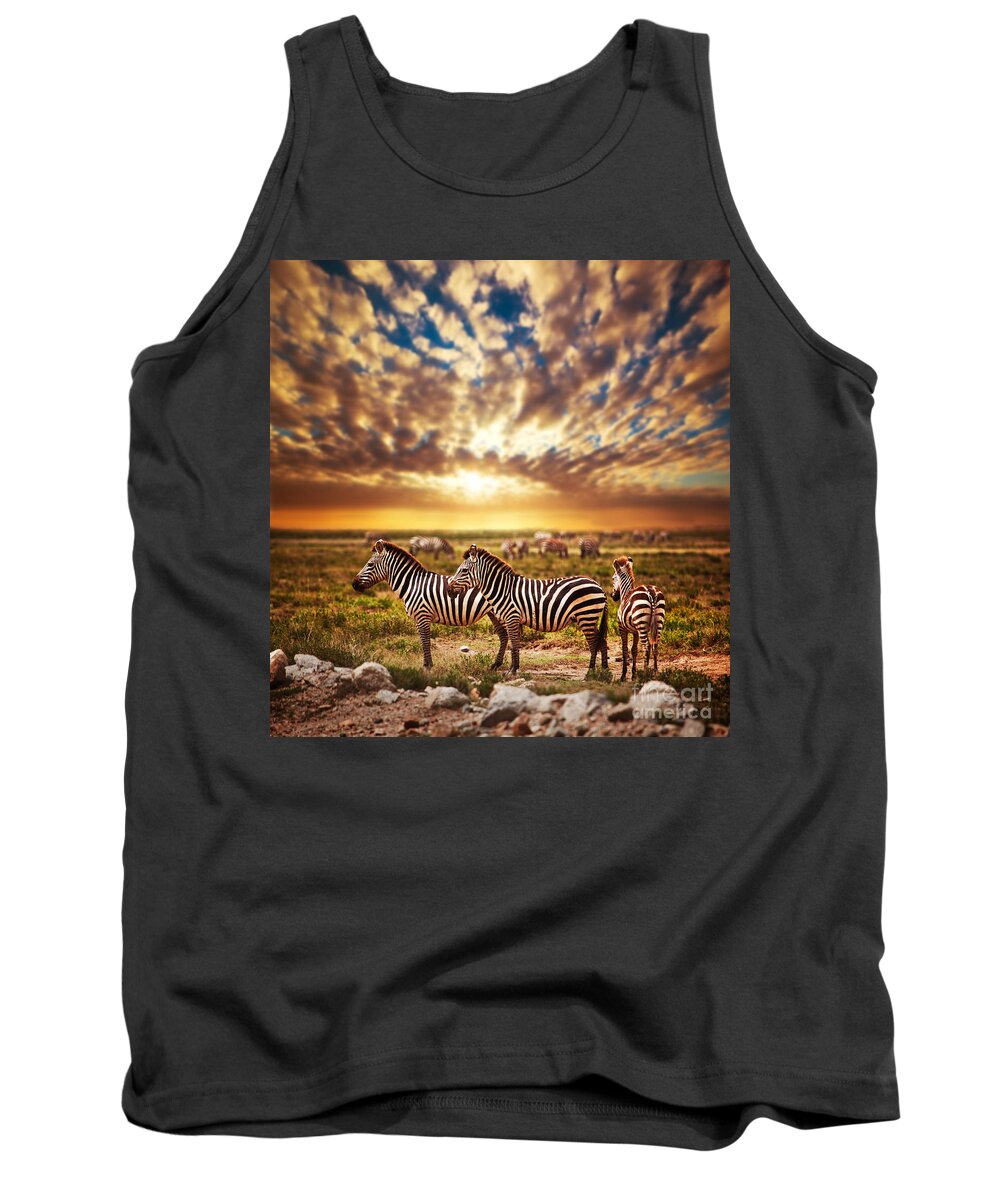 Africa Tank Top featuring the photograph Zebras herd on African savanna at sunset. #1 by Michal Bednarek