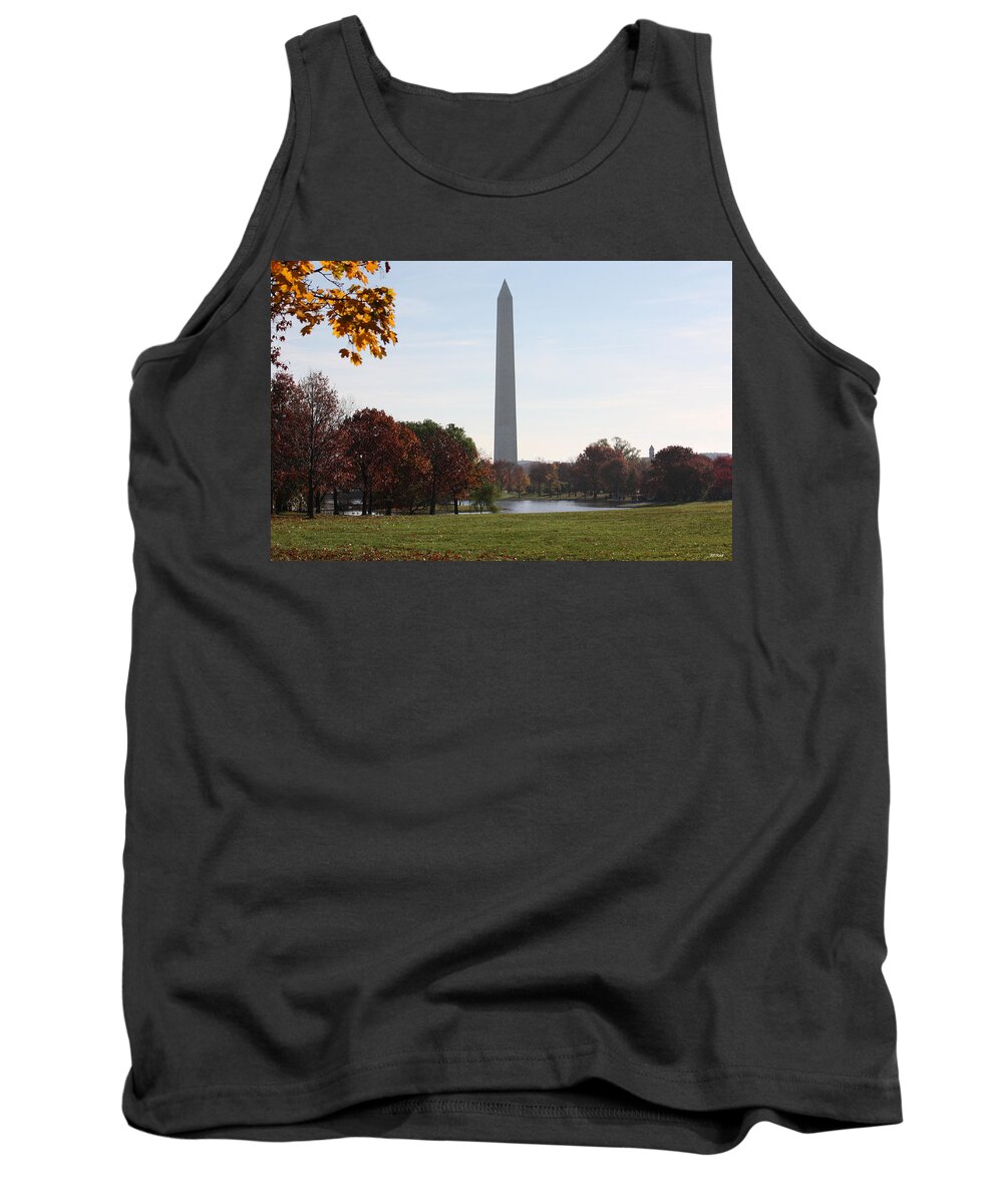 Capital Tank Top featuring the photograph Capital Autumns - The Washington Monument - under the Trees by Ronald Reid