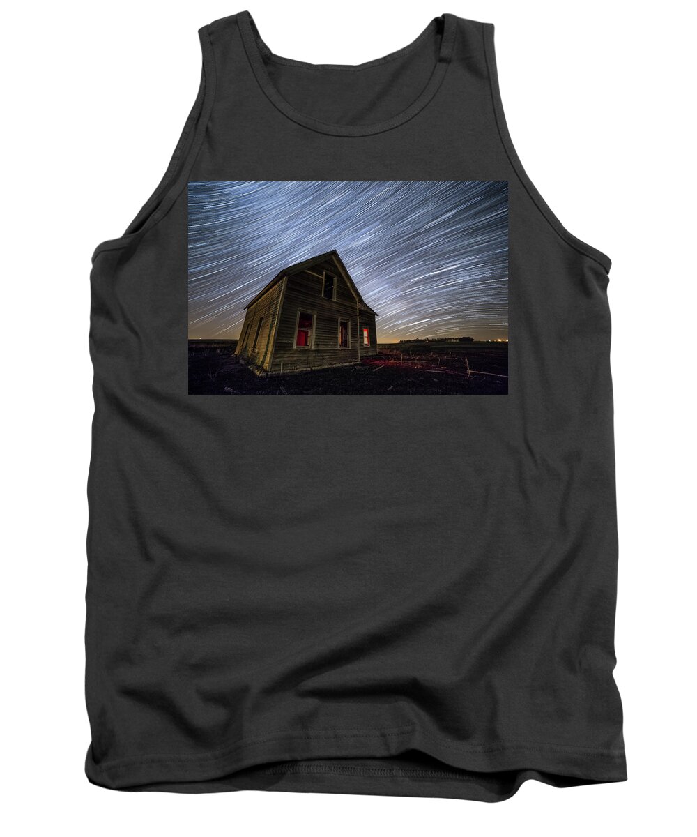 Dark Places Tank Top featuring the photograph Dark Place with Star Trails by Aaron J Groen