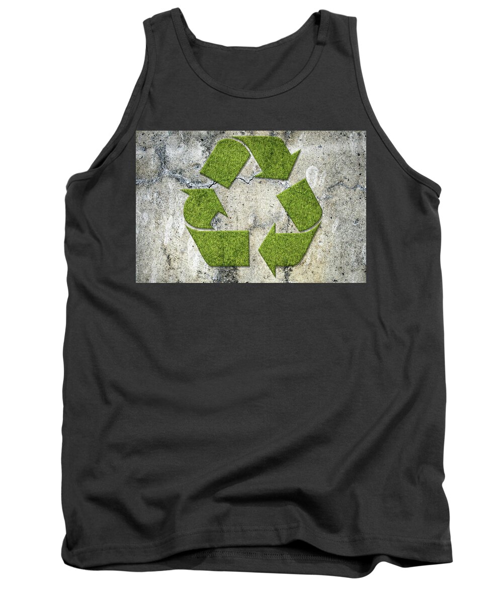 Recycling Tank Top featuring the photograph Green recycling sign on a concrete wall by GoodMood Art