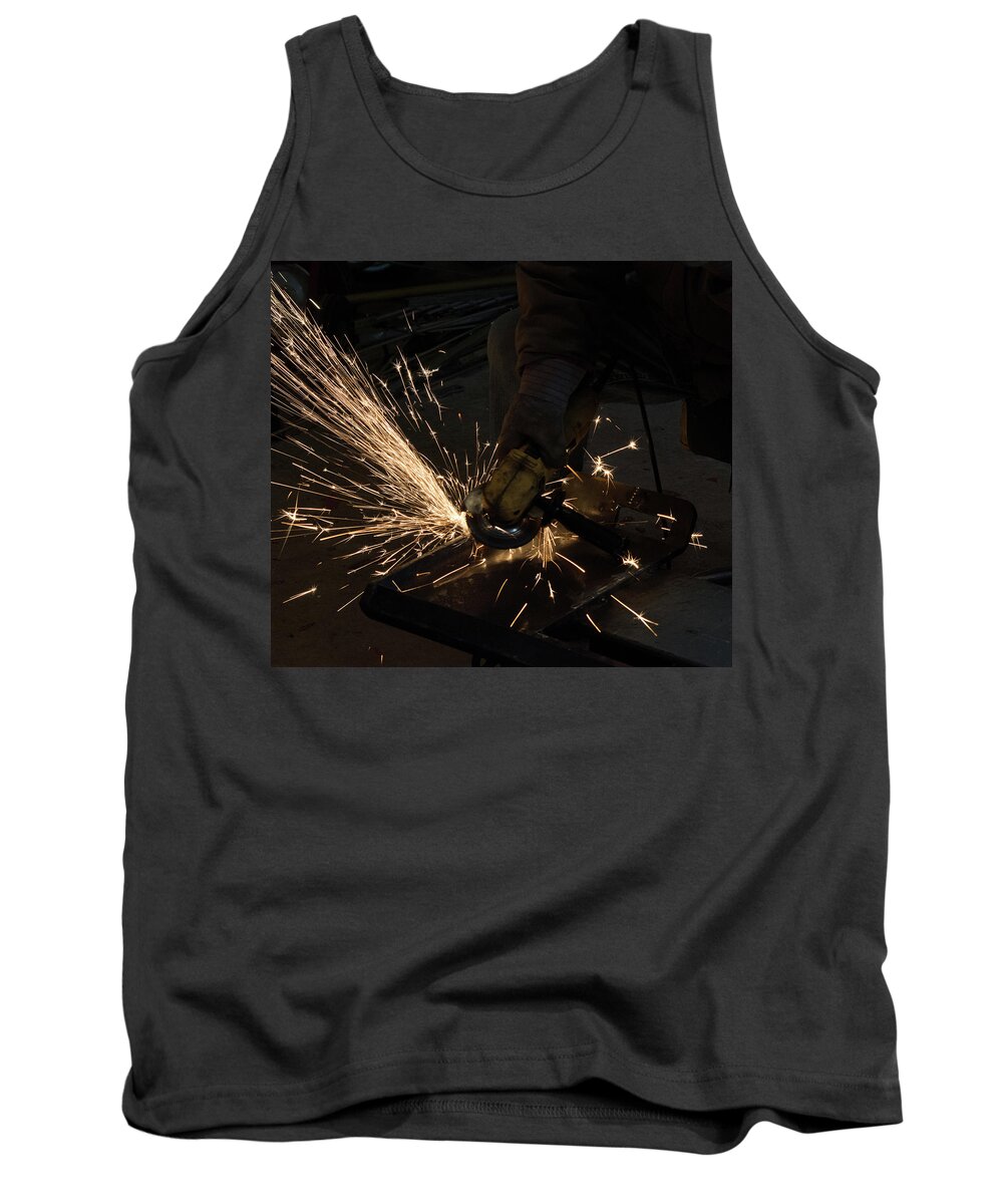Grinding Tank Top featuring the photograph Grinding Steel by Michael Hall
