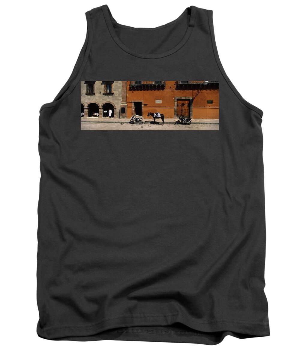 Photography Tank Top featuring the photograph Horse Standing Between Two Motorcycles by Panoramic Images