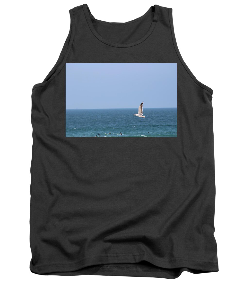 Seagull Tank Top featuring the photograph Seagull Flying over Huntington Beach by Colleen Cornelius