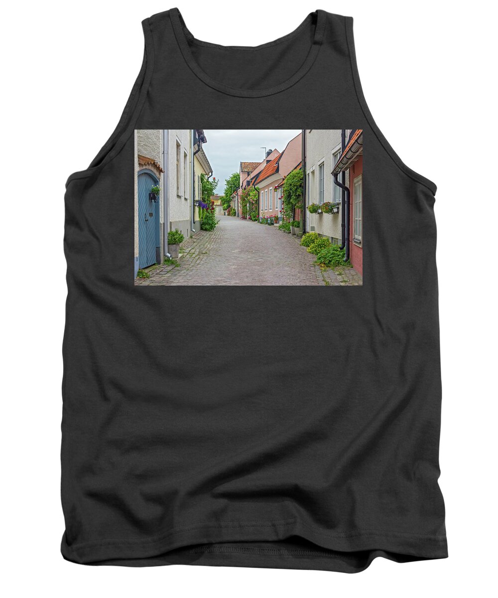 Street Tank Top featuring the photograph Street with old houses in a Swedish town Visby by GoodMood Art