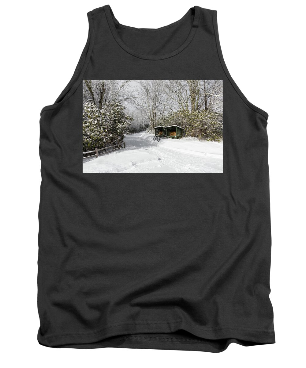 Snow Tank Top featuring the photograph Wagon Wheels and Firewood by D K Wall