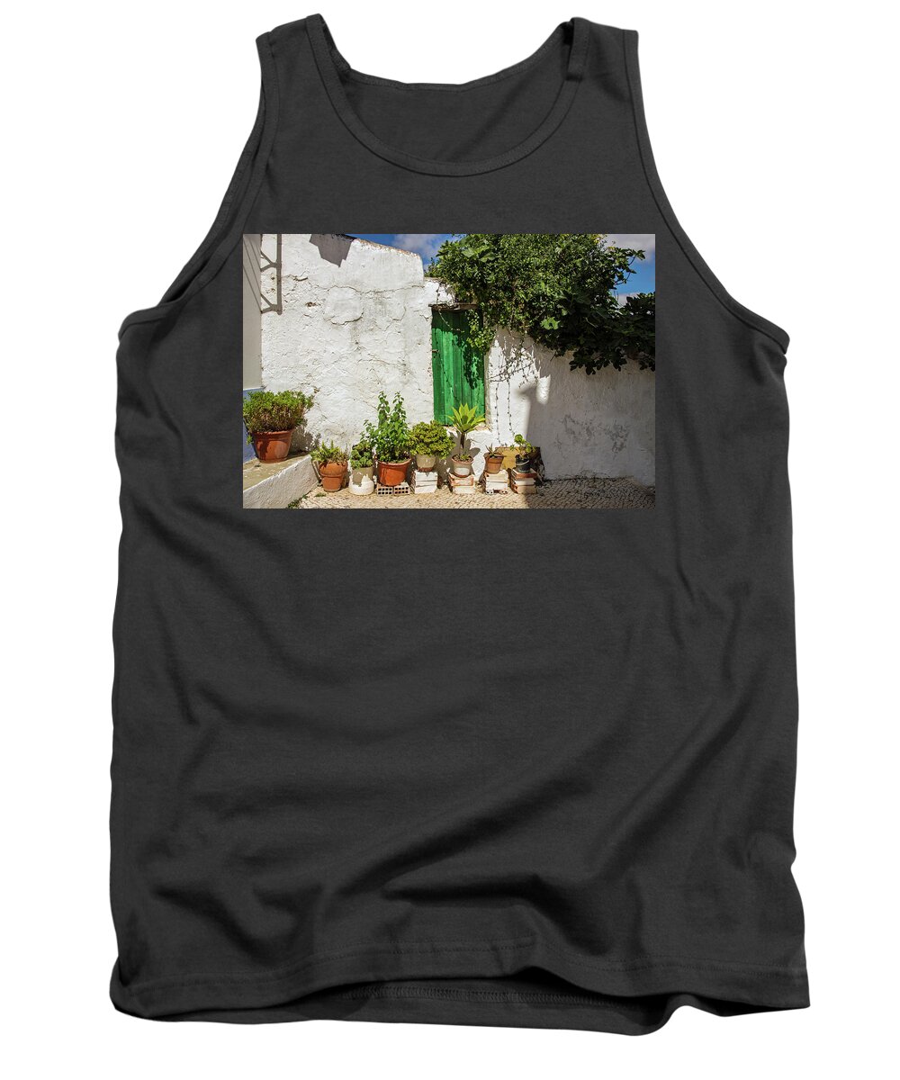 Wall Tank Top featuring the photograph Wall with Green Door by Jeff Townsend