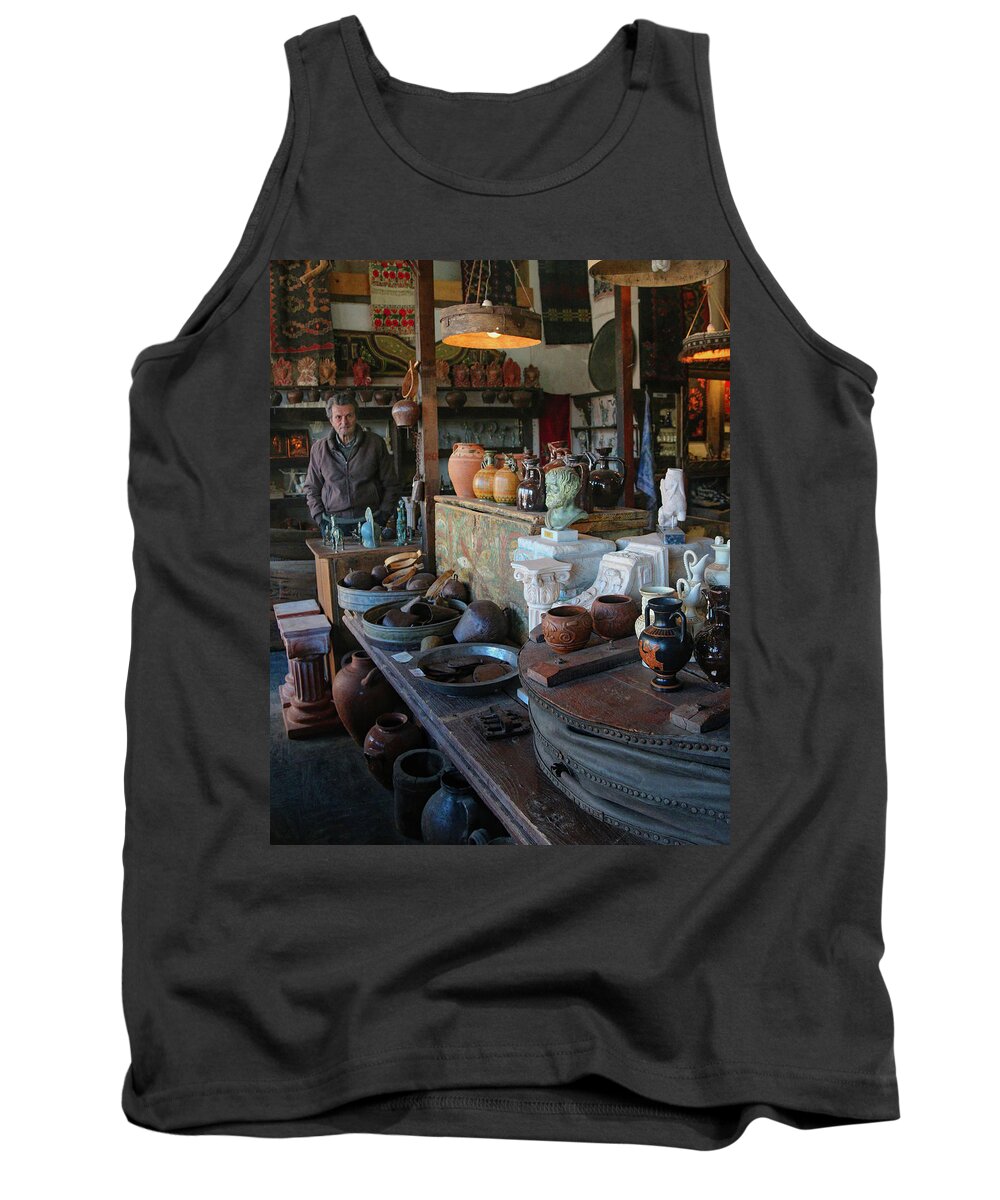 Greece Tank Top featuring the photograph Man in Shop in Delphi by M Kathleen Warren