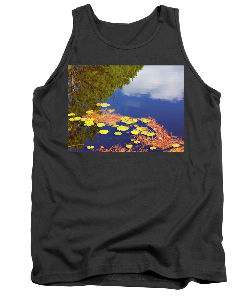 Blue Tank Top featuring the photograph Reflections in a lily pond by Charles Floyd