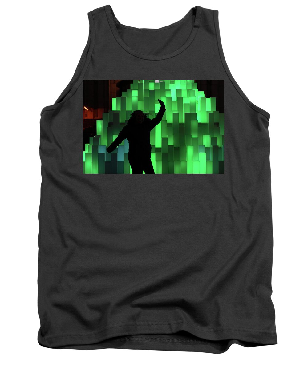 Silhouette Tank Top featuring the photograph Silhouette of a girl on Green by Andrew Lalchan