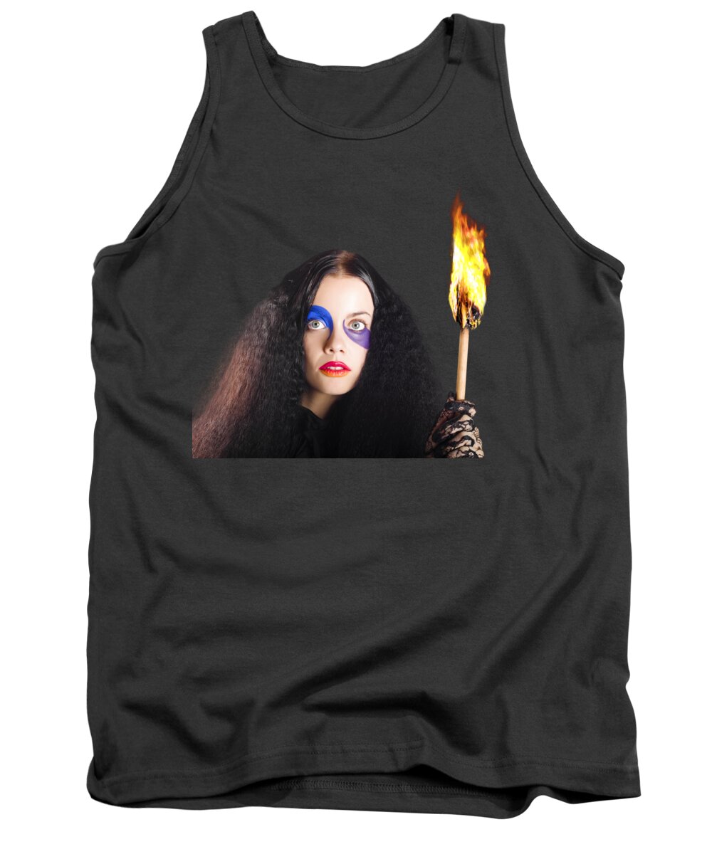 Mystery Tank Top featuring the photograph Staring woman holding flame torch by Jorgo Photography