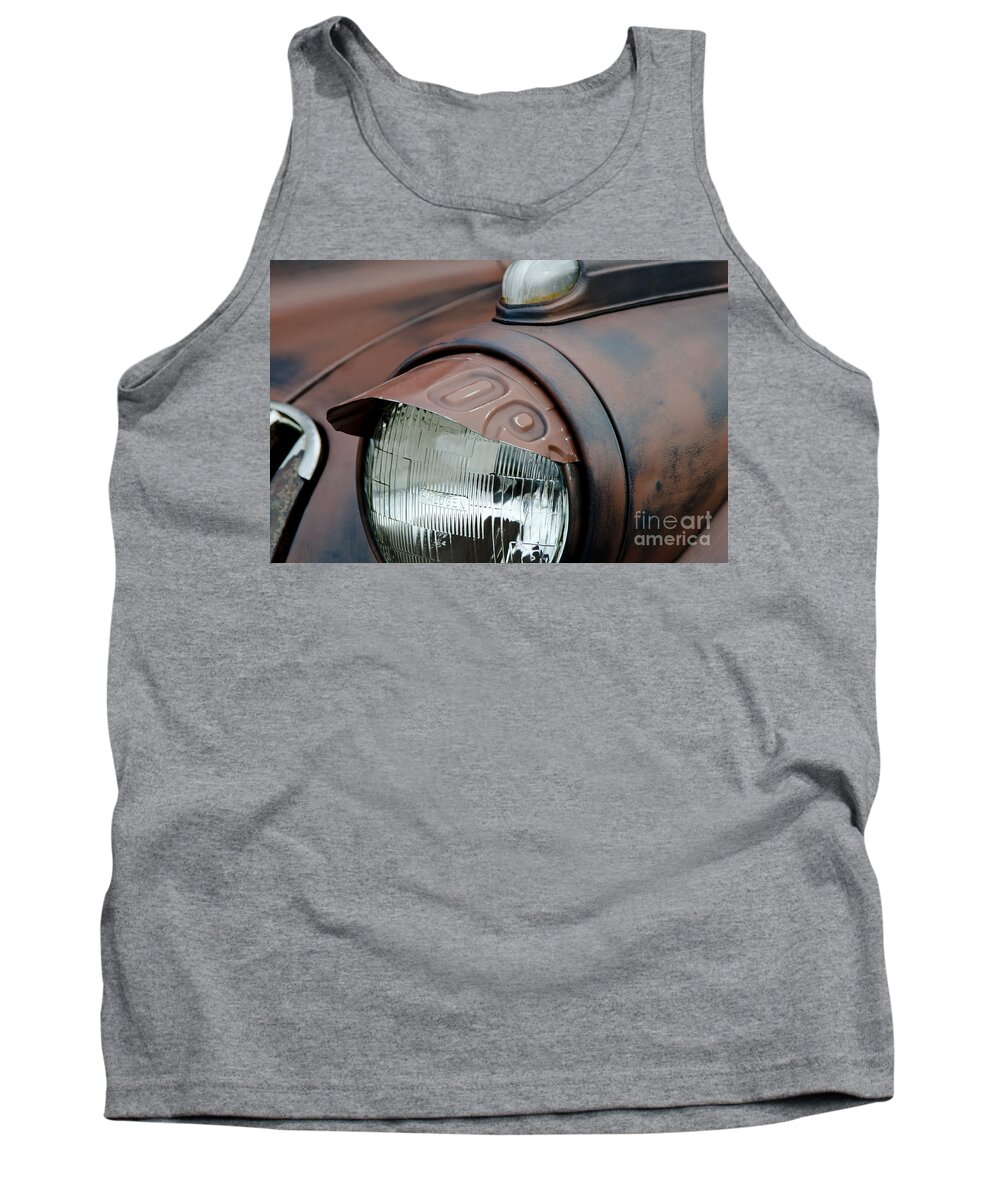Headlight Eyebrow Cover Tank Top featuring the photograph License Tag Eyebrow Headlight Cover by Wilma Birdwell